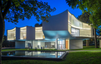 Bendheim helical channel glass curves by Steven Holl at night