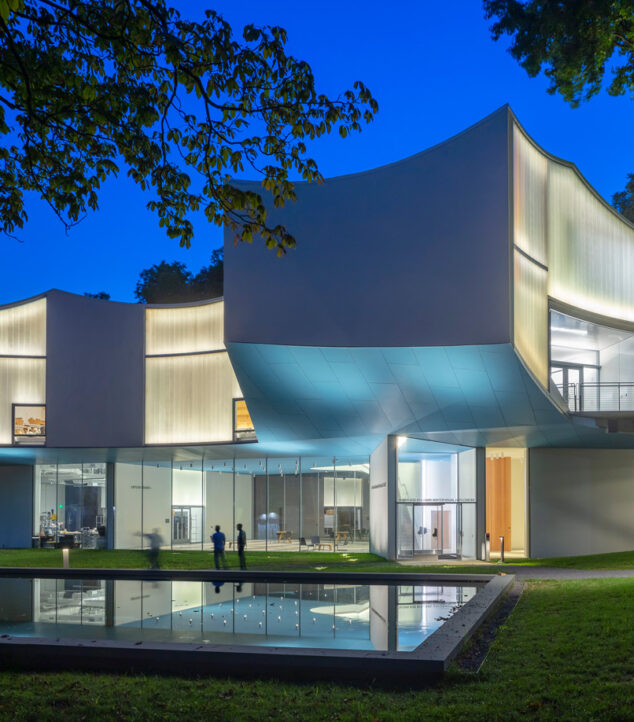Bendheim helical channel glass curves by Steven Holl at night