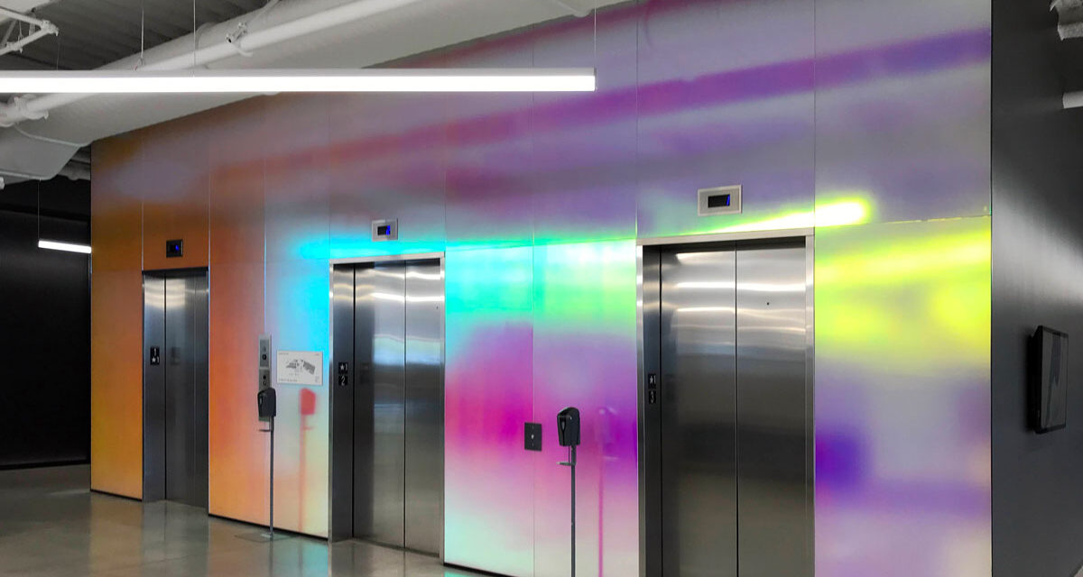 Pluralsight dichroic glass lobby with soft-etched finish