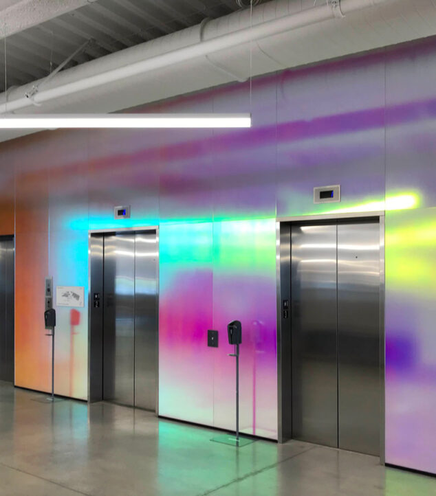 Pluralsight dichroic glass lobby with soft-etched finish