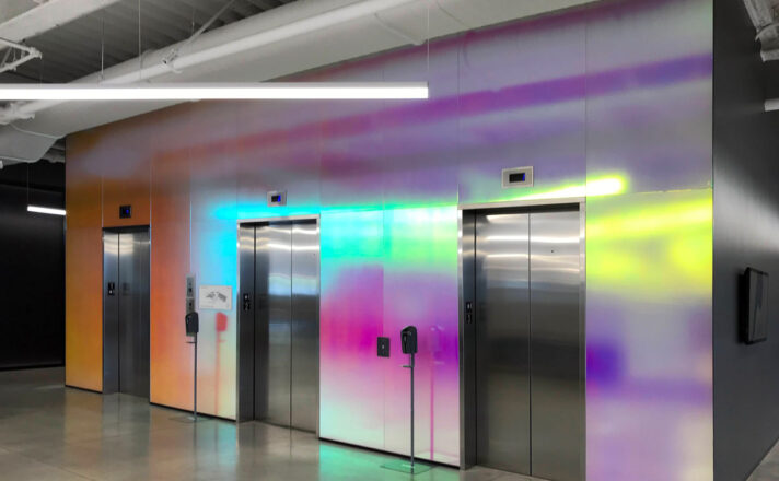 Pluralsight dichroic glass lobby with soft-etched finish