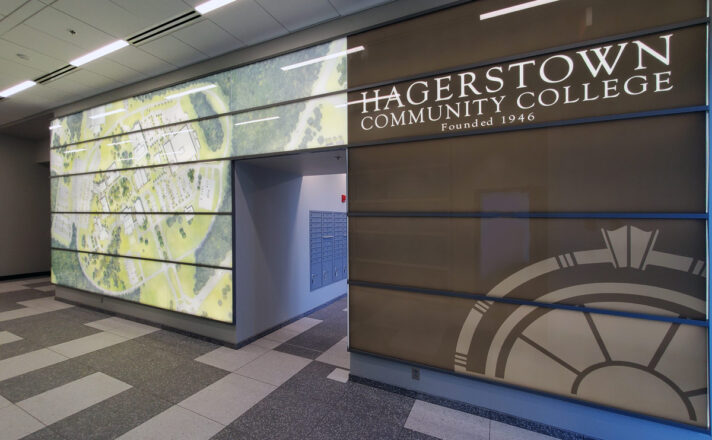 TurnKey backlit glass wall system by Bendheim cladding the lobby walls.