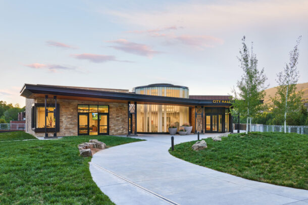 Back entrance of the building with channel glass