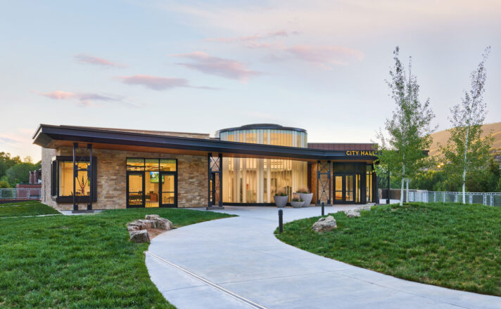 Back entrance of the building with channel glass
