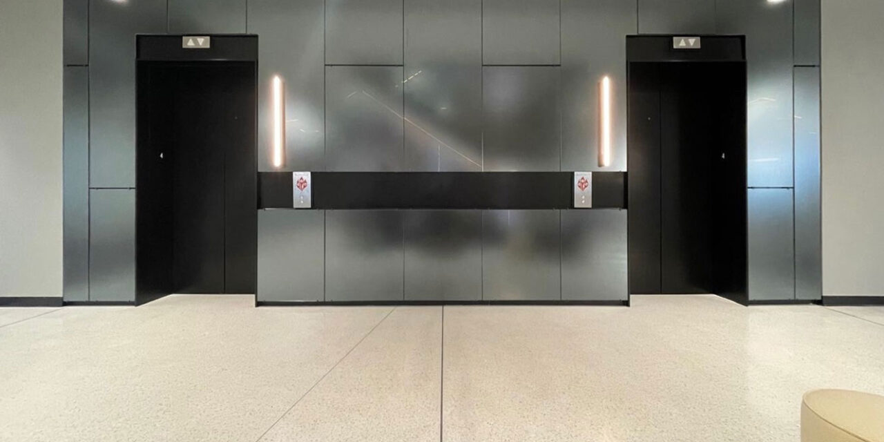 TurnKey glass wall cladding at an elevator lobby.
