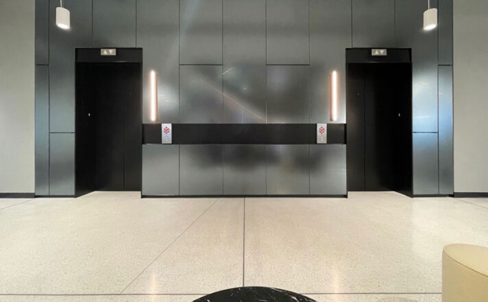 TurnKey glass wall cladding at an elevator lobby.