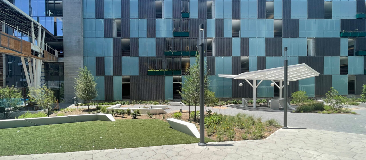 Glass facade on parking structure.