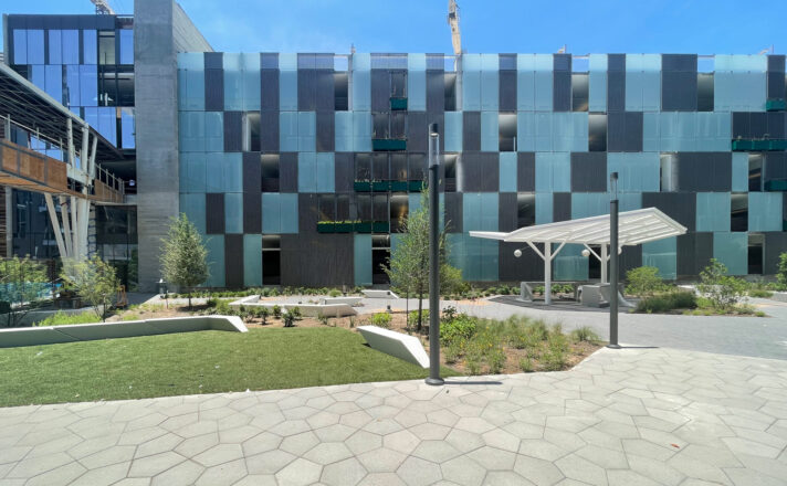 Glass facade on parking structure.