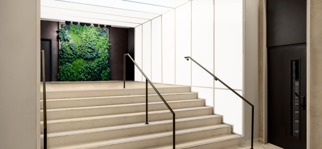 TurnKey Fusion Light Wall creating back-lit walls in a lobby.