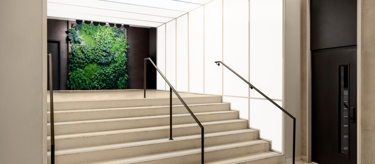 TurnKey Fusion Light Wall creating back-lit walls in a lobby.