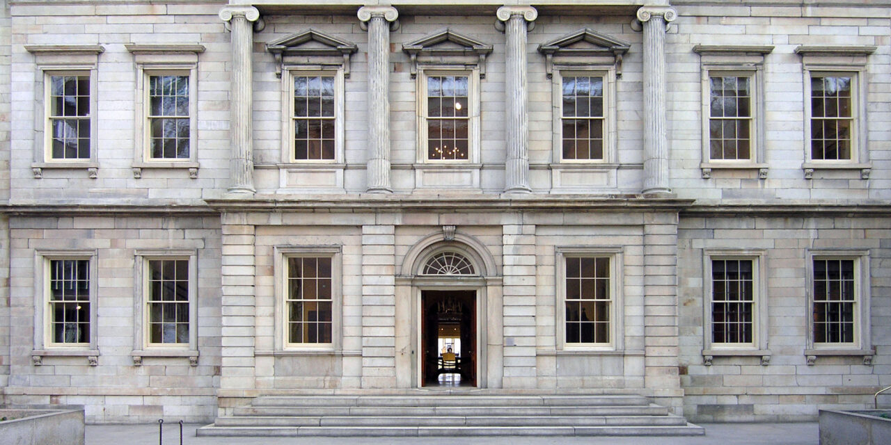 Restoration Glass® in the windows of the Branch Bank of the United States facade at the Metropolitan Museum of Art.