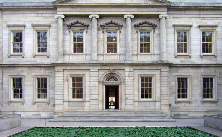 Restoration Glass® in the windows of the Branch Bank of the United States facade at the Metropolitan Museum of Art.