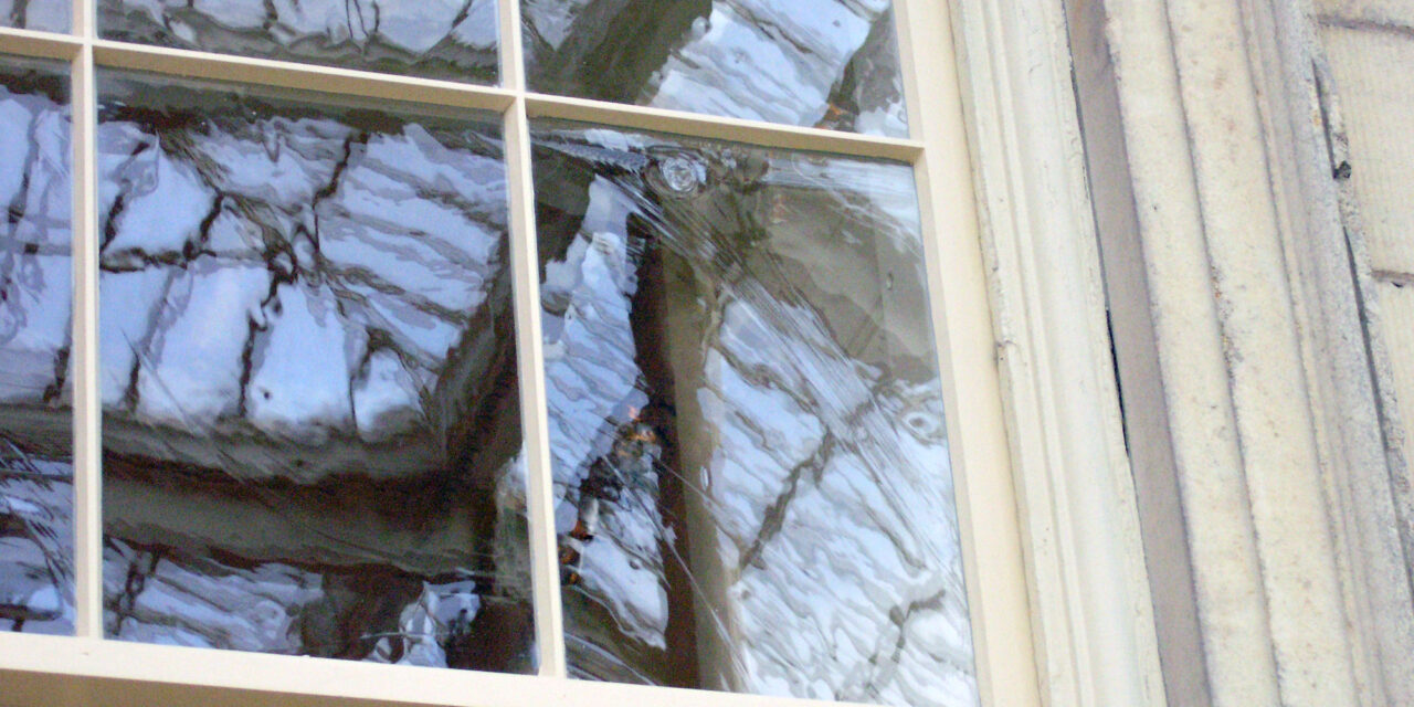 Restoration Glass® in the windows of the Branch Bank of the United States facade at the Metropolitan Museum of Art.