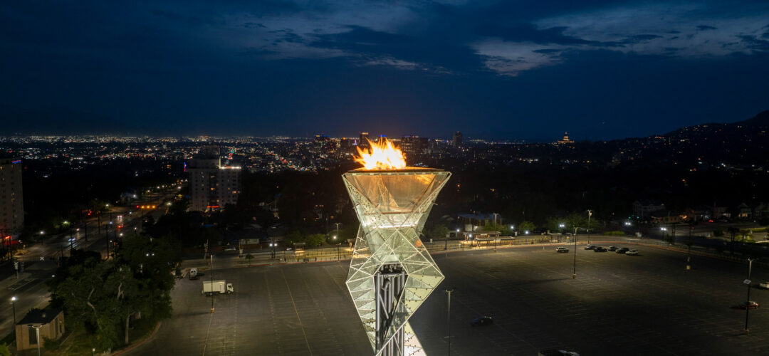 Olympic Cauldron torch lit at night.