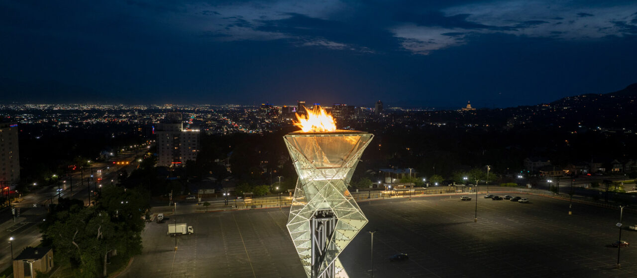 Olympic Cauldron torch lit at night.