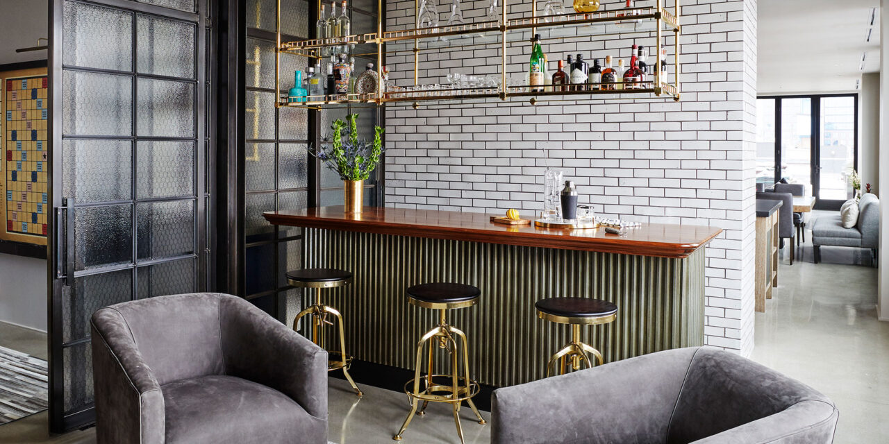 Lounge with doors and walls made of Bendhiem's chicken wire glass.
