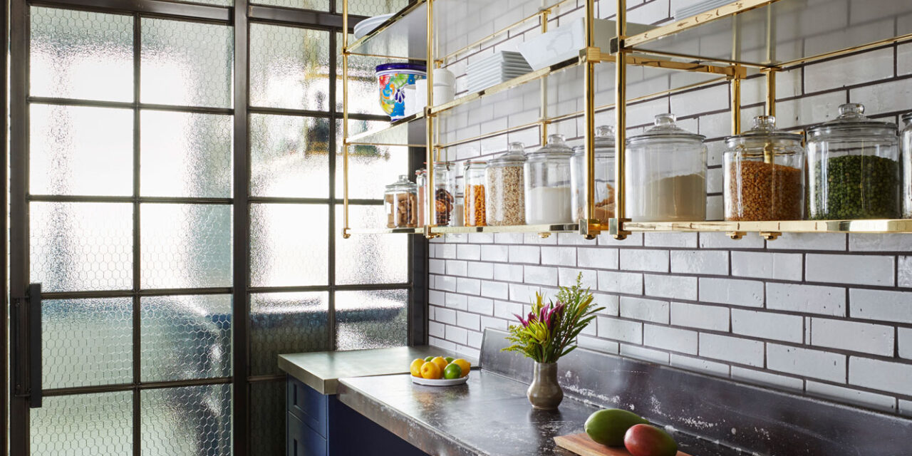 Kitchen with doors and walls made of Bendhiem's chicken wire glass.