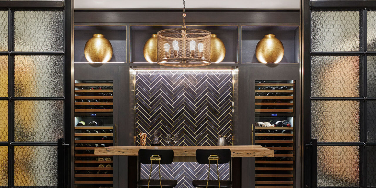 Wine room with doors and walls made of Bendhiem's chicken wire glass.