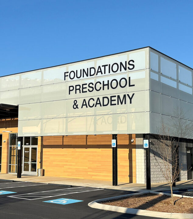 Decorative glass rainscreen on pre-school exterior.