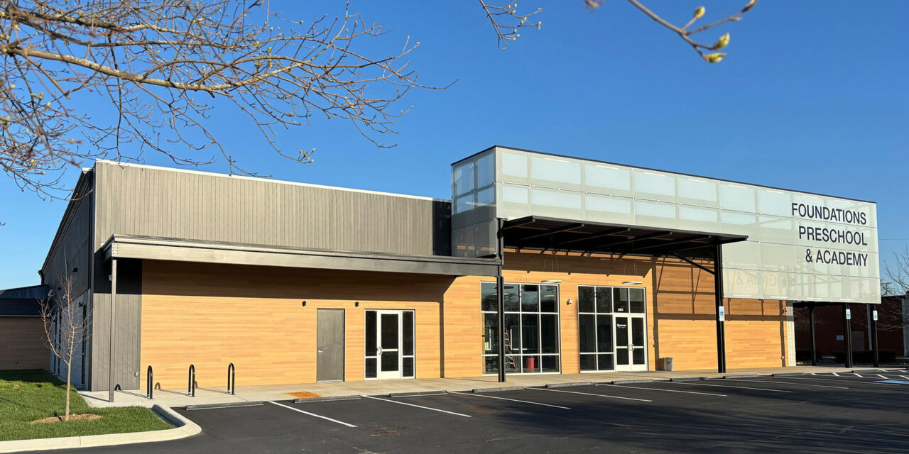 Decorative glass rainscreen on pre-school exterior.