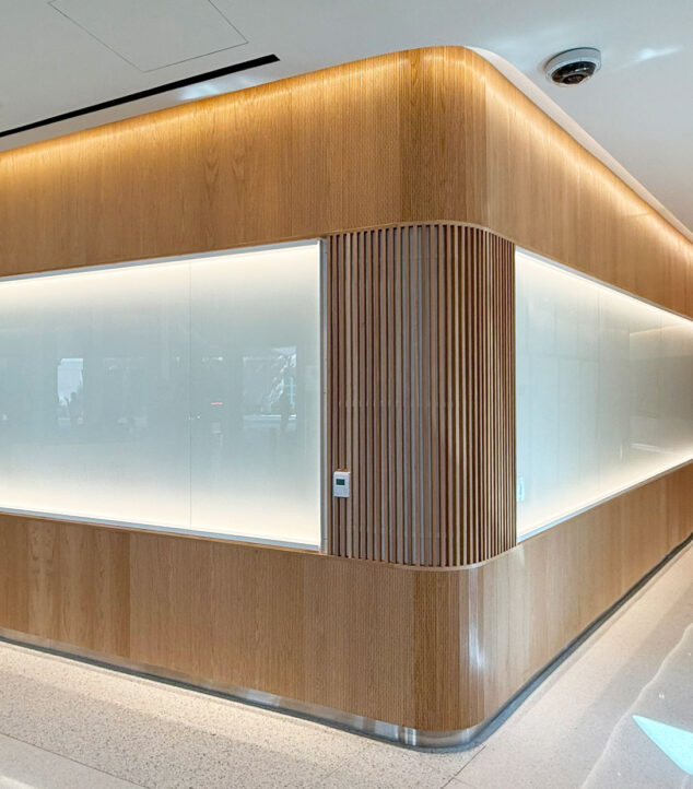 White back-painted glass in Bendheim's TurnKey glass wall cladding system.