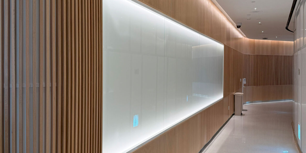 White back-painted glass in Bendheim's TurnKey glass wall cladding system.