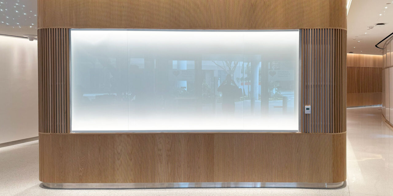 White back-painted glass in Bendheim's TurnKey glass wall cladding system.