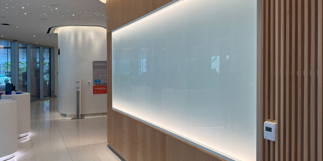 White back-painted glass in Bendheim's TurnKey glass wall cladding system.