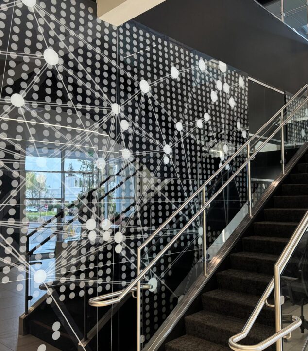 Digitally printed glass wall in the lobby of NXP's headquarters.