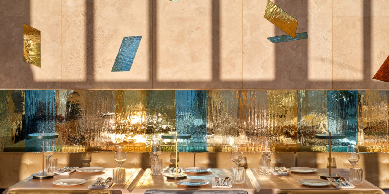 Restaurant with colorful mirrored mouth-blown glass panels in the walls.