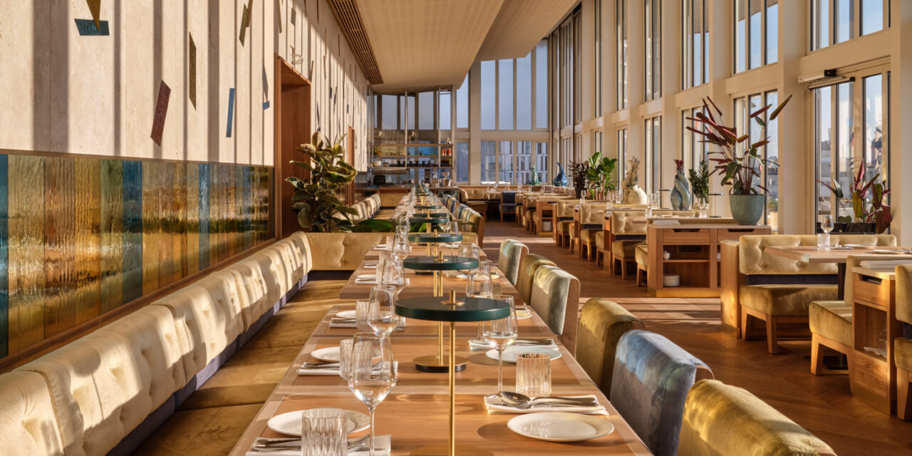 Restaurant with colorful mirrored mouth-blown glass panels in the walls.