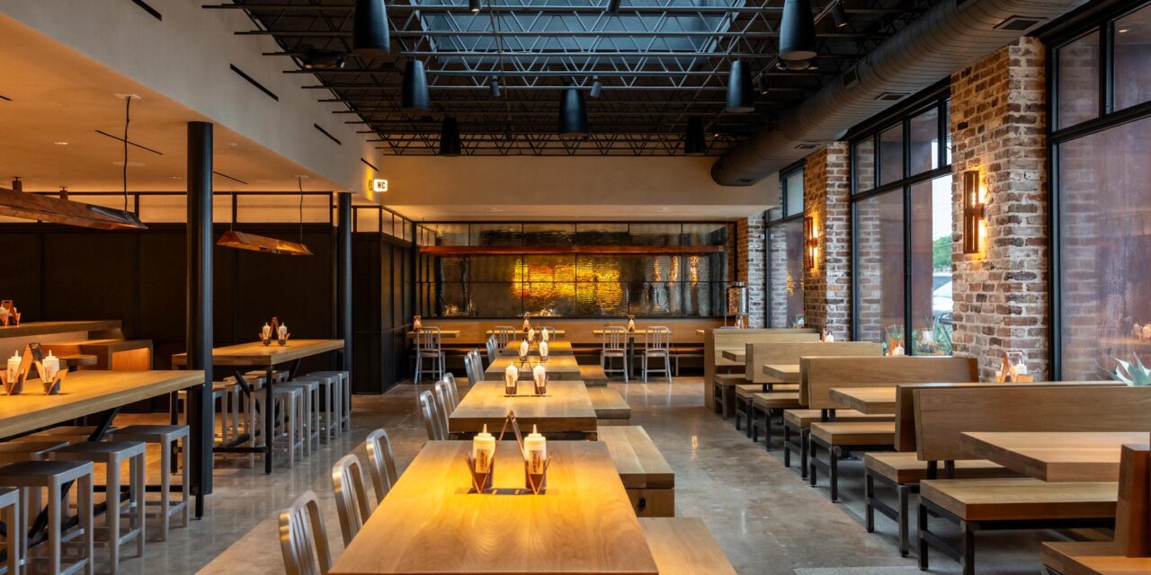 Textured mirrored glass wall in a restaurant.