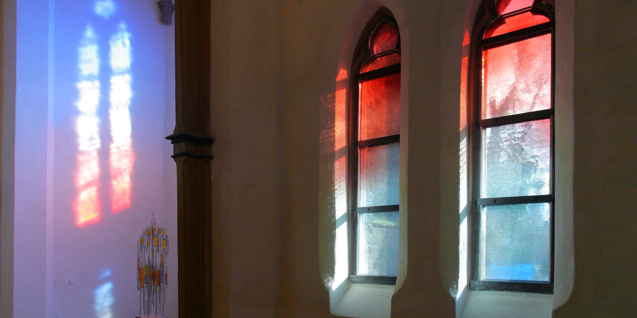Church windows with mouth-blown glass.