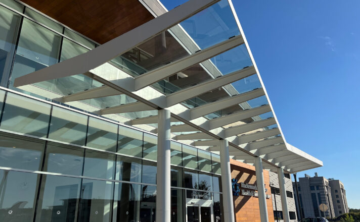 Bendheim glass canopy system in front of a healthcare facility.