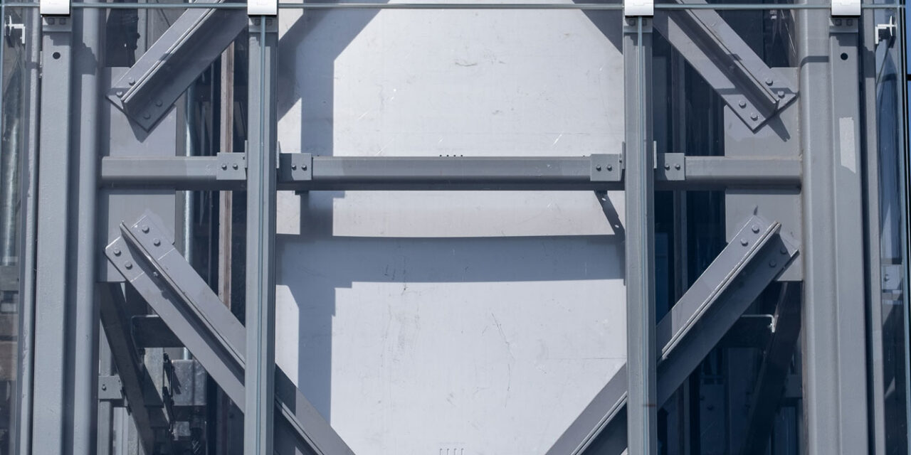 Elevator shaft enclosed by Bendheim's glass rainscreen system.