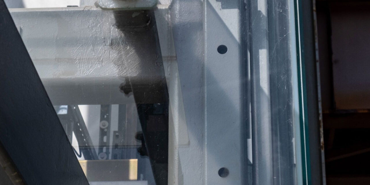 Elevator shaft enclosed by Bendheim's glass rainscreen system.