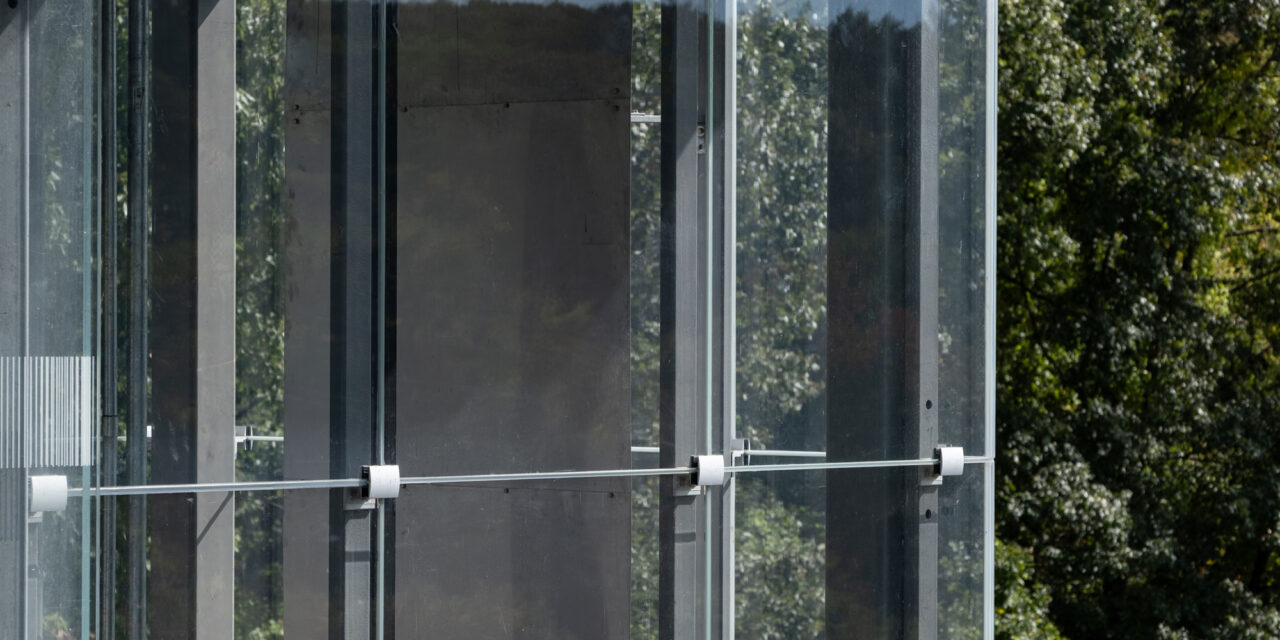 Elevator shaft enclosed by Bendheim's glass rainscreen system.