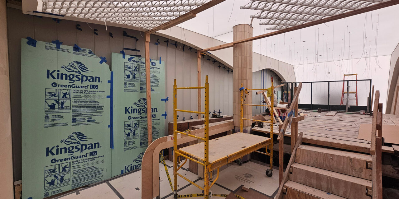 The channel glass wall being installed at Lululemon.