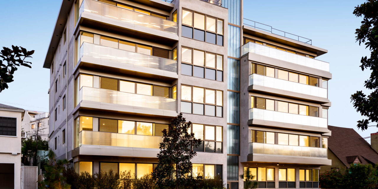 Apartment building with railings made of Bendheim's textured glass, and a facade of Bendheim channel glass.