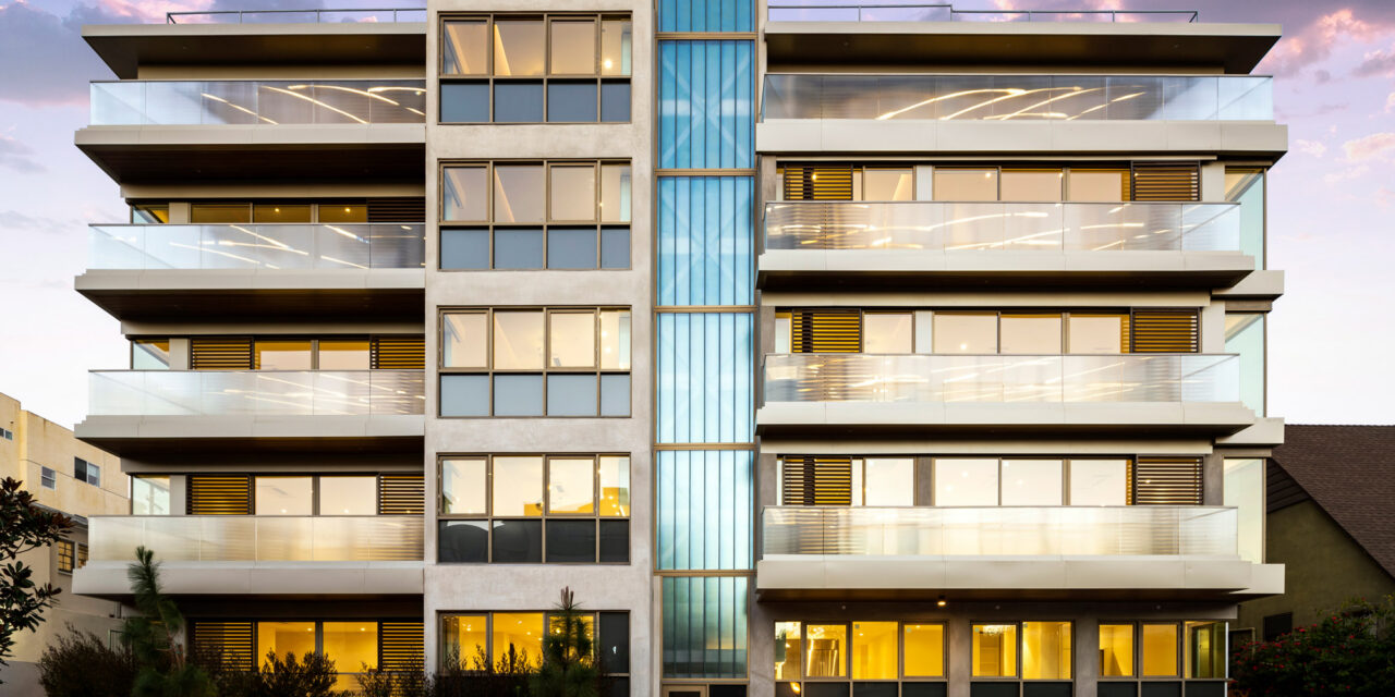 Apartment building with railings made of Bendheim's textured glass, and a facade of Bendheim channel glass.